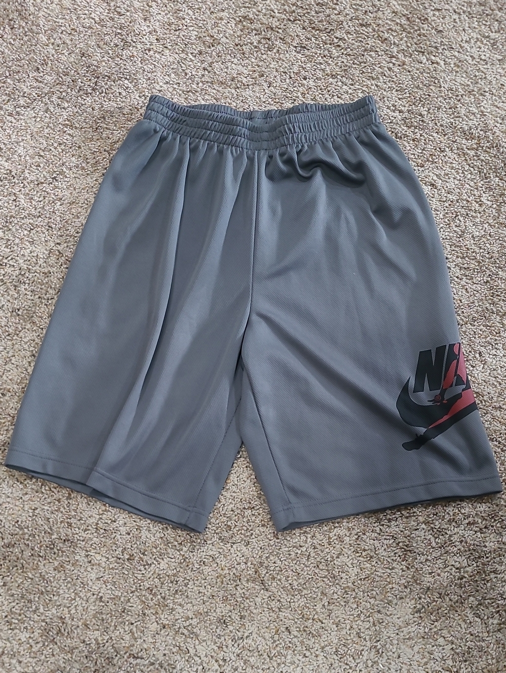 Nike Youth Gray Athletic Shorts with Black & Red Logo